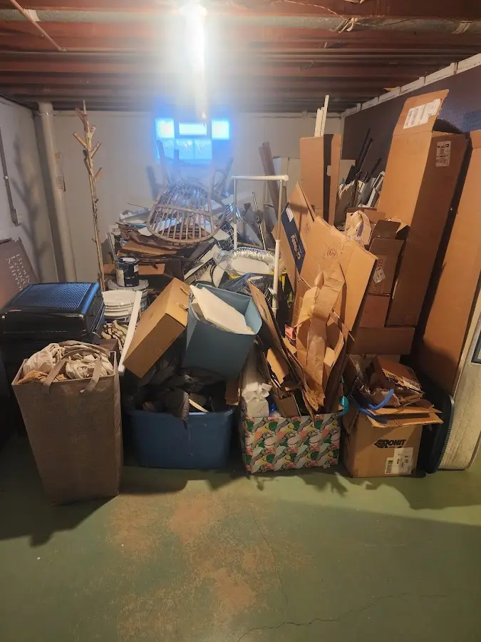 Roll-off dumpster container at job site for Roll Off Dumpster Rental in Huntington